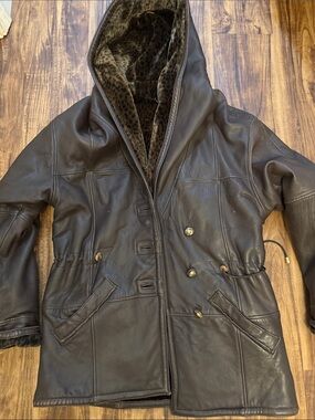 Woman’s reversible Brown Hooded Leather Coat with Leopard Lining.